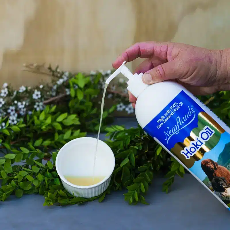 lovely golden hoki oil pumping into a white bowl